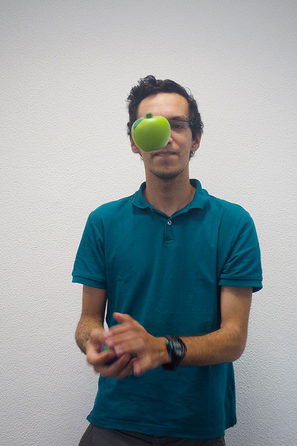 Man throwing an apple