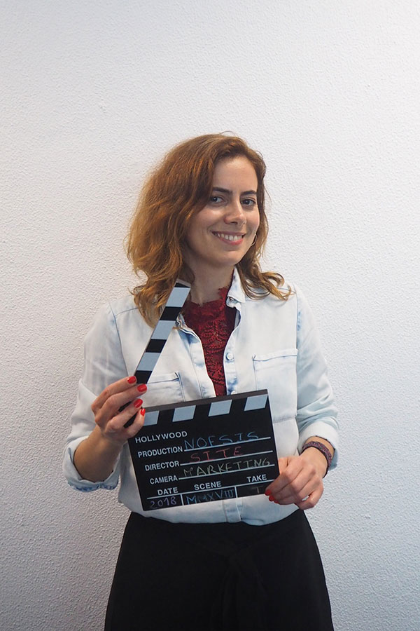 Woman with a clapperboard