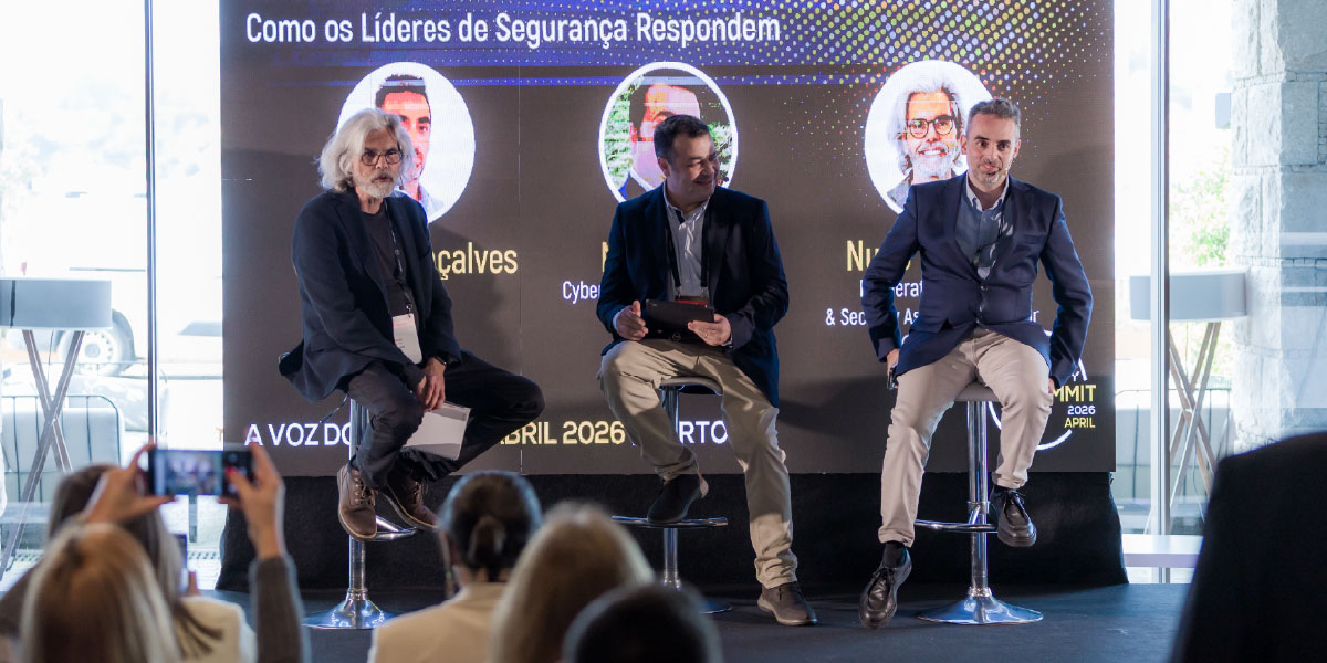Speakers in discussion during a cybersecurity panel at the IT Security Summit Porto