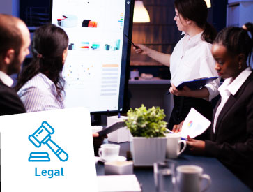 In a conference room, a woman presents data on a large screen to colleagues. A legal symbol with a gavel and the word "Legal" appears in the foreground.