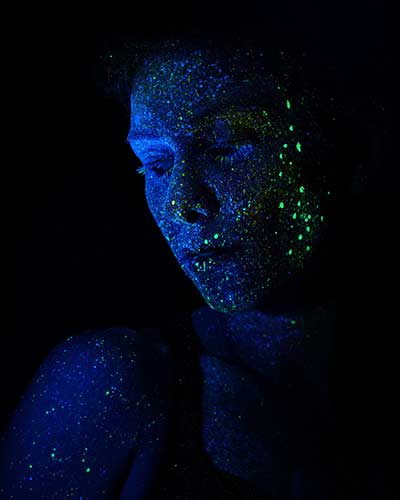 Woman with shining glitter represents our solutions based on Cloud and IoT technology